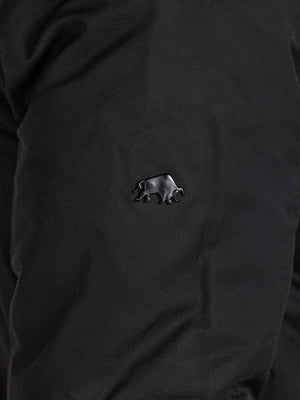 Black shirt with a small bear emblem on the chest.