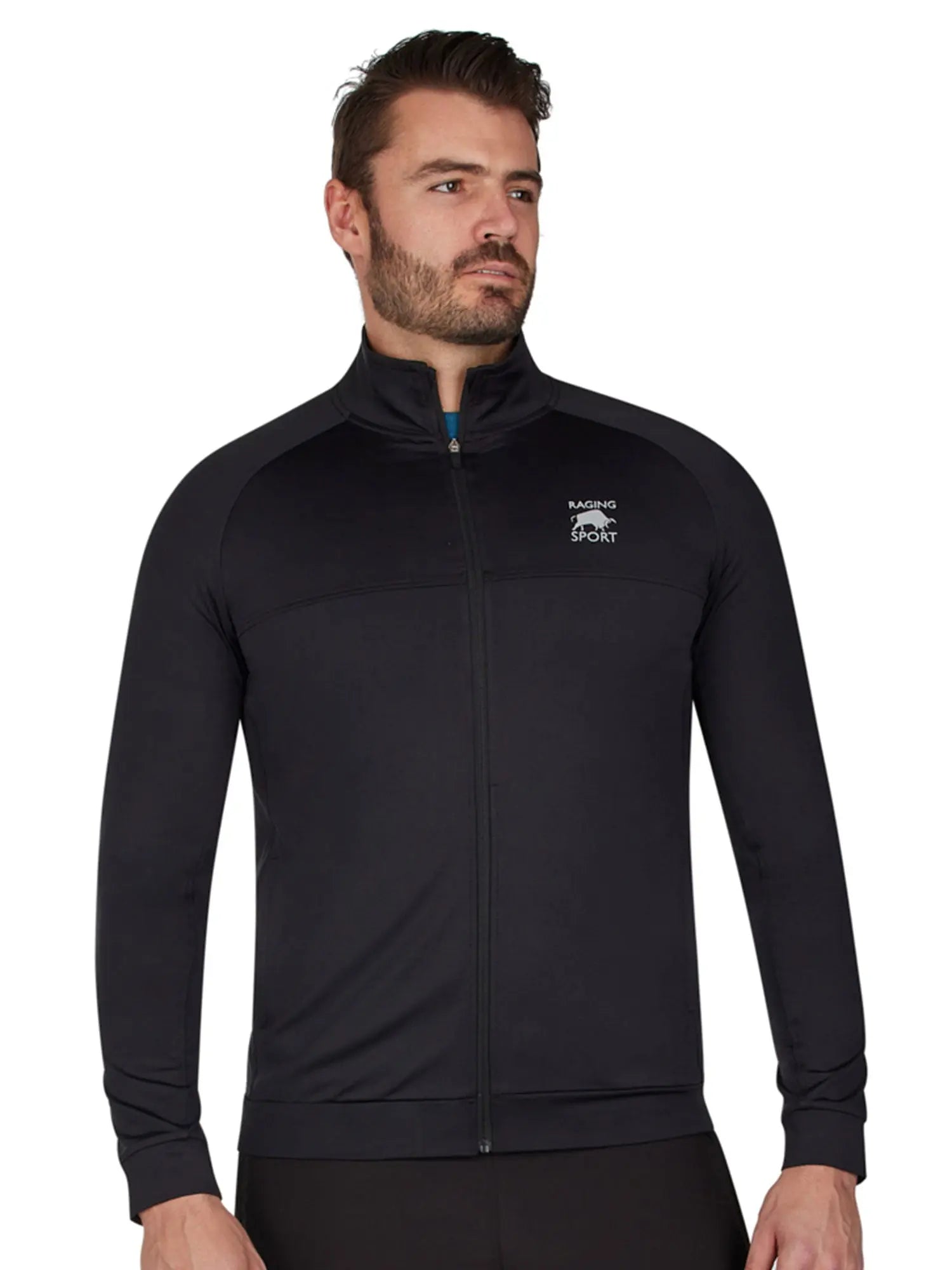 A man wearing a black performance track top with a high neck and zip front, paired with black workout pants.