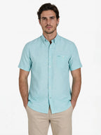 Man wearing Raging Bull Classic Linen Short Sleeve Shirt in Apple Green, available in sizes S-6XL, front detail. 