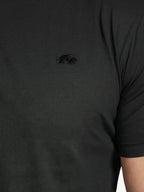 Man wearing Raging Bull Classic Organic t-shirt in black, front Bull logo detail.