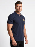 Man wearing a Raging Bull Classic Rugby Short sleeve shirt in navy.