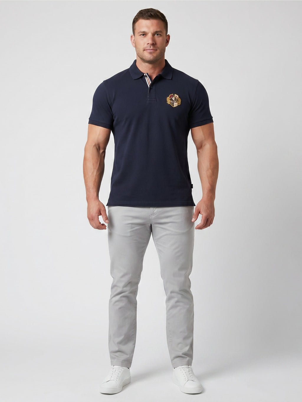 Man wearing a Raging Bull Classic Rugby Short sleeve shirt in navy, full length front. 