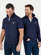 Two men wearing navy blue pullovers with a logo on a white background