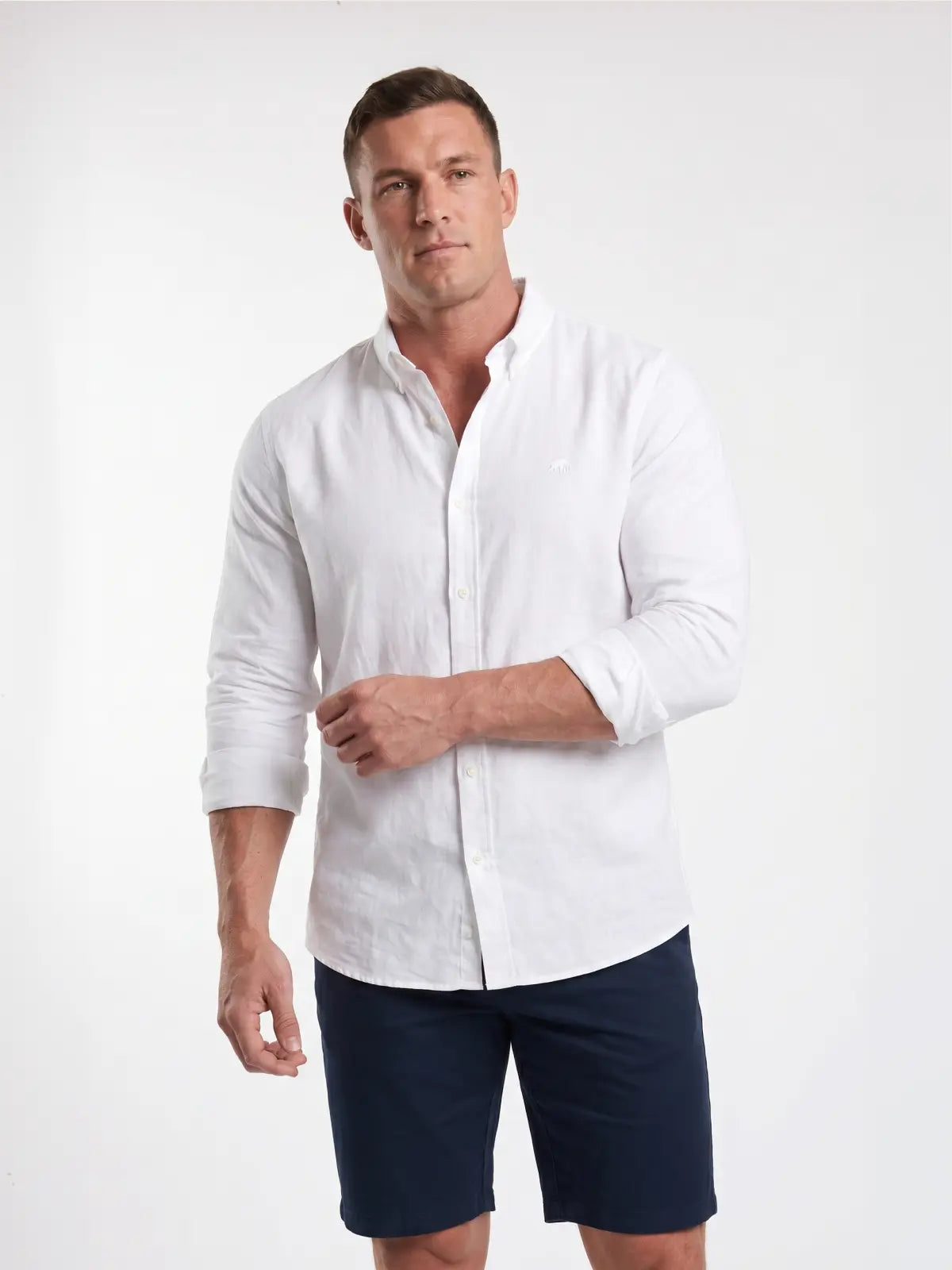Man wearing Raging Bull linen shirt in white, front. 