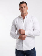 Man wearing Raging Bull Linen Look Long Sleeve Shirt in White, available in sizes S-6XL, front detail. 