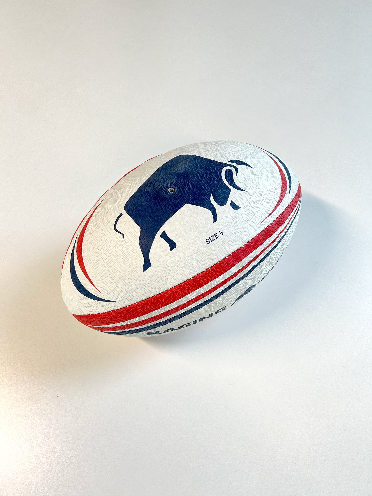 Raging Bull rugby ball on a white backround