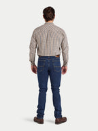 Man wearing a plaid shirt and blue jeans on a white background