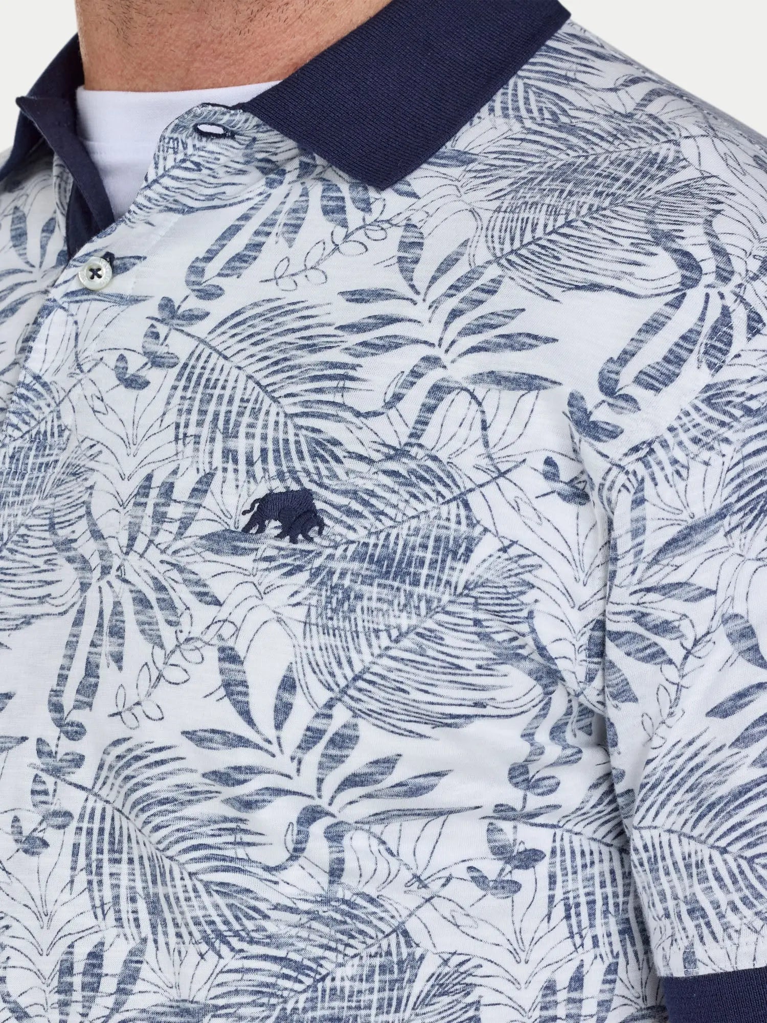 Close-up of a patterned shirt with blue and white design