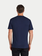 Man wearing a navy blue t-shirt on a white background
