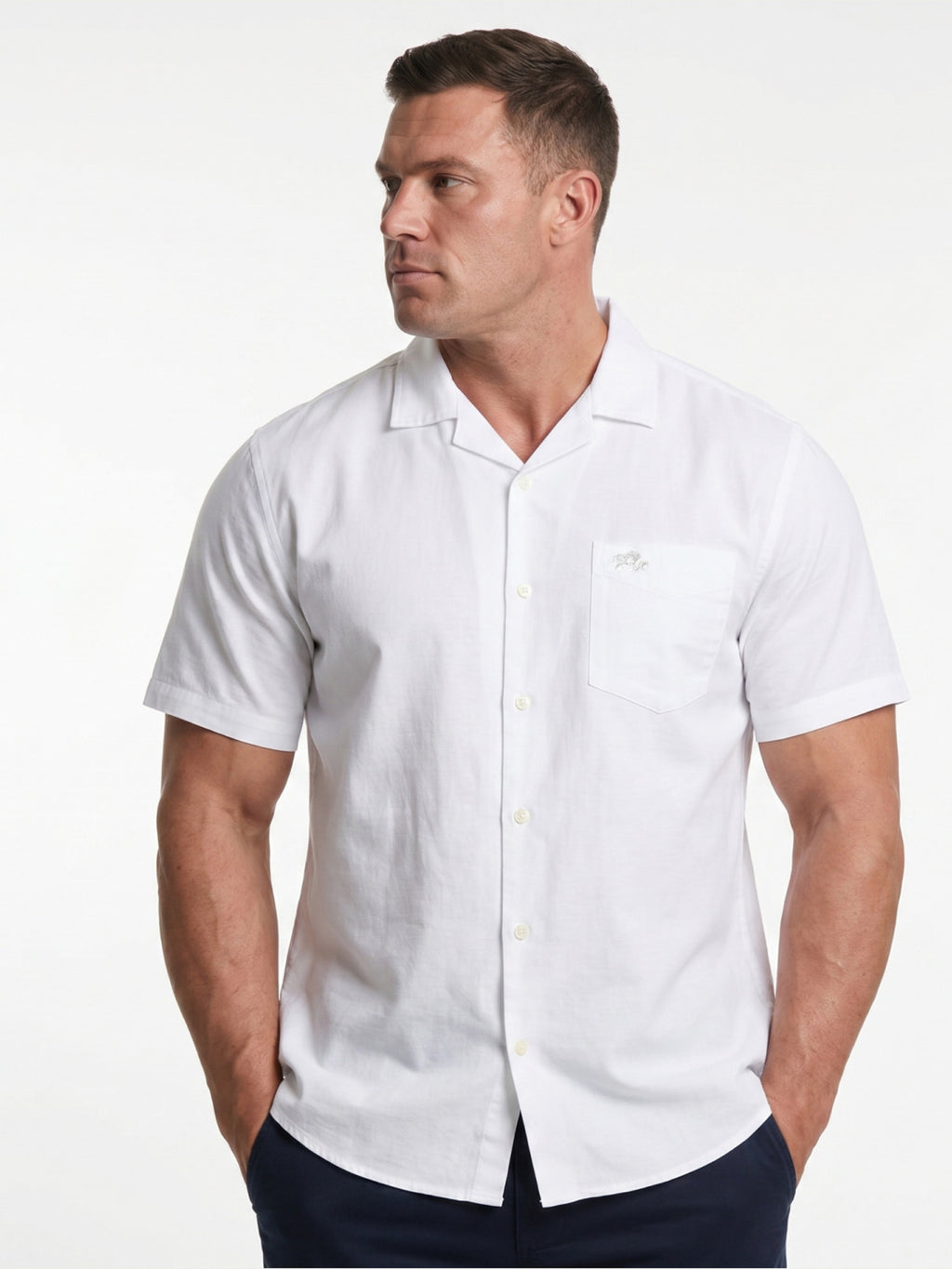 Man wearing Raging Bull Seersucker Revere Collar Short Sleeve Shirt in White, available in sizes S-6XL, front detail. 