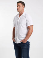 Man wearing Raging Bull Seersucker Revere Collar Short Sleeve Shirt in White, available in sizes S-6XL, side. 