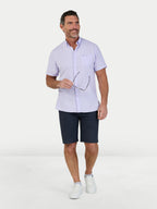 Man wearing Raging Bull Classic Linen Short Sleeve Shirt in Lilac and Classic Chino in navy, available in sizes S-6XL.