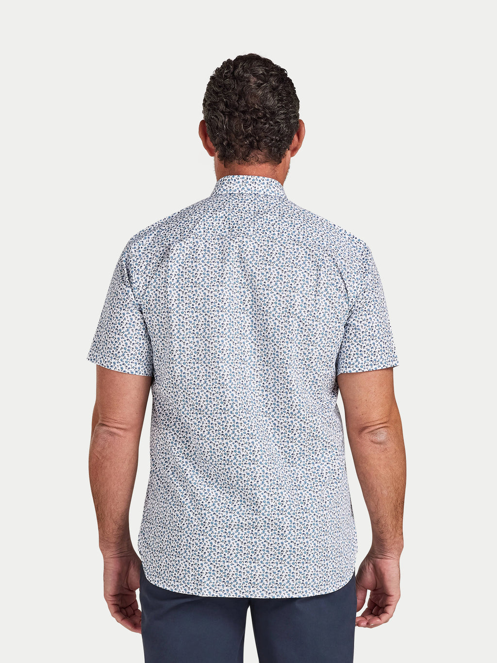 Man wearing Raging Bull Floral Cotton Poplin Short Sleeve Shirt in Sky Blue on White, back detail, available in sizes S-6XL.