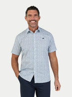 Man wearing Raging Bull Floral Cotton Poplin Short Sleeve Shirt in Sky Blue, available in sizes S-6XL.