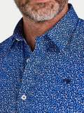 Close-up of a man wearing Raging Bull Flower Bud Cotton Poplin Short Sleeve Shirt in Navy, available in sizes S-6XL.