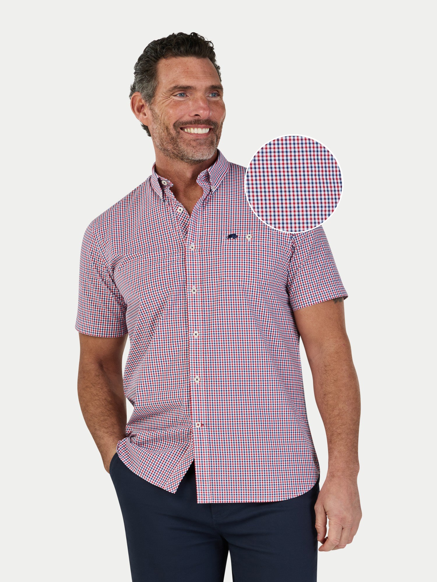 Man wearing Raging Bull Graph Check Poplin Short Sleeve Shirt in Red, available in sizes S-6XL, front detail.