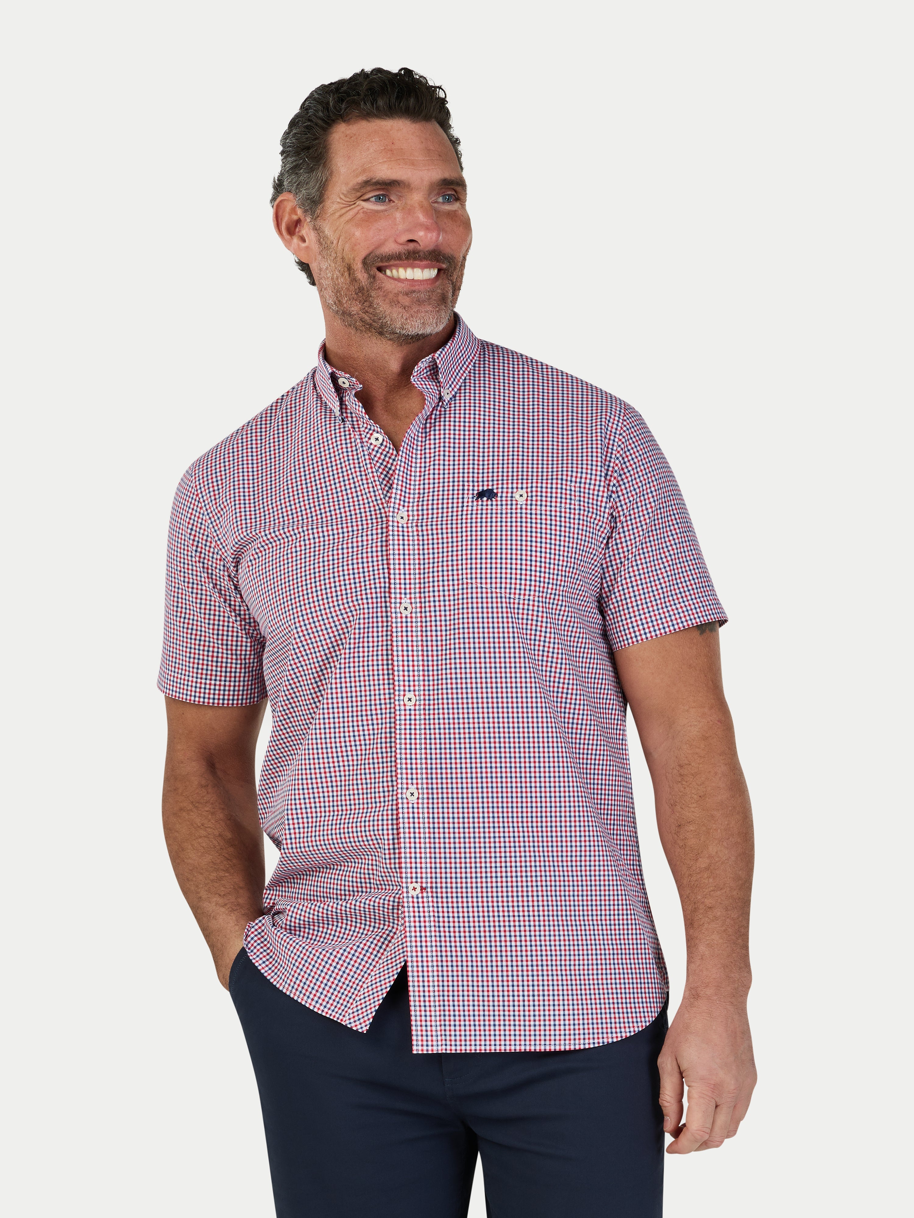 Man wearing Raging Bull Graph Check Poplin Short Sleeve Shirt in Red, available in sizes S-6XL.