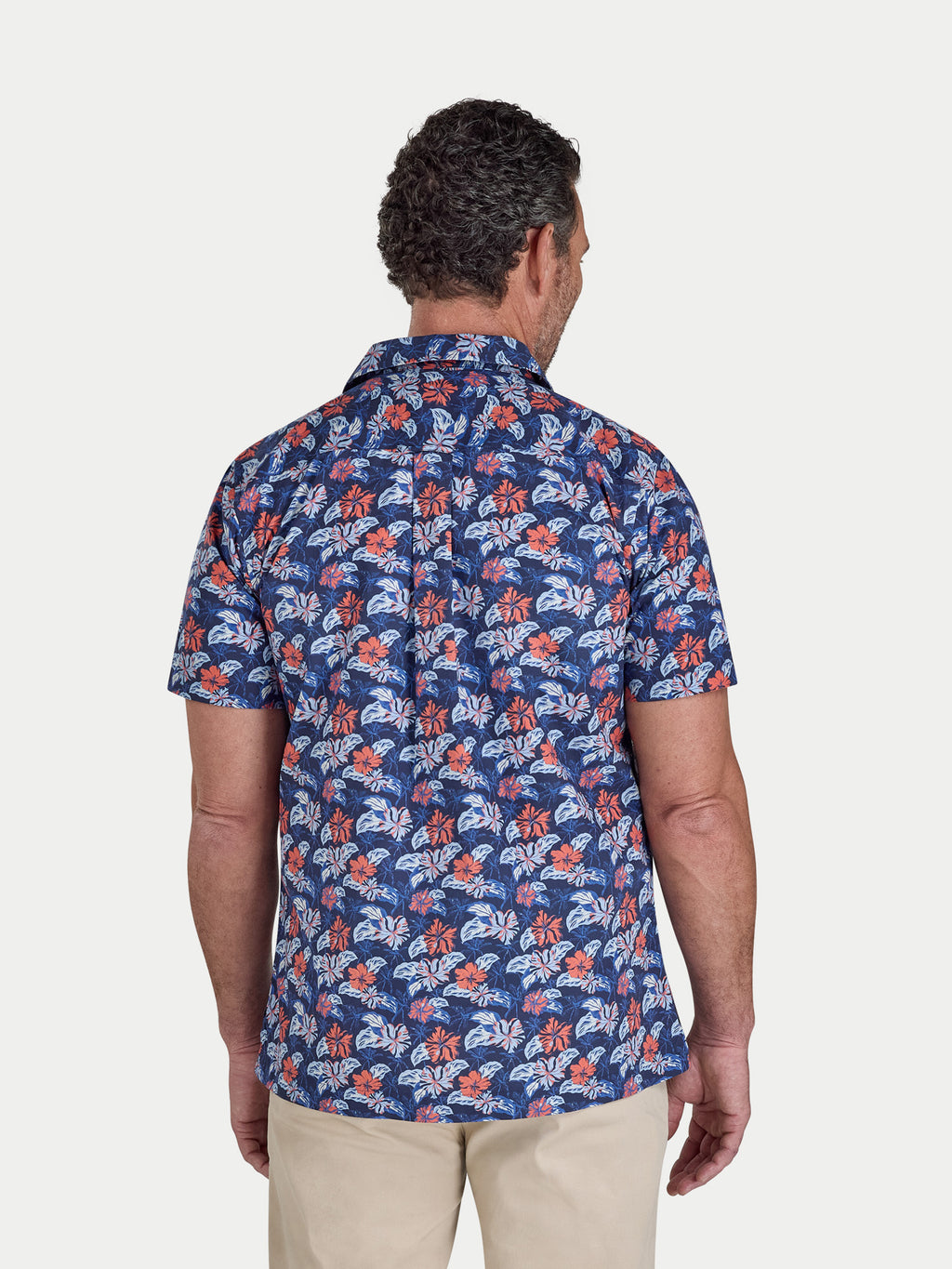 Man wearing Raging Bull Hawaii Floral Poplin Short Sleeve Shirt in Navy, back detail, available in sizes S-6XL.