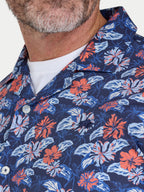 Man wearing Raging Bull Hawaii Floral Poplin Short Sleeve Shirt in Navy, chest and collar detail, available in sizes S-6XL.