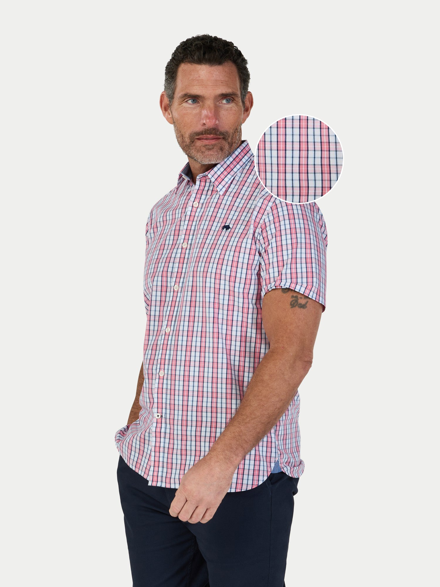 Man wearing Raging Bull Large Check Cotton Poplin Short Sleeve Shirt in Pink, available in sizes S-6XL, front detail. 