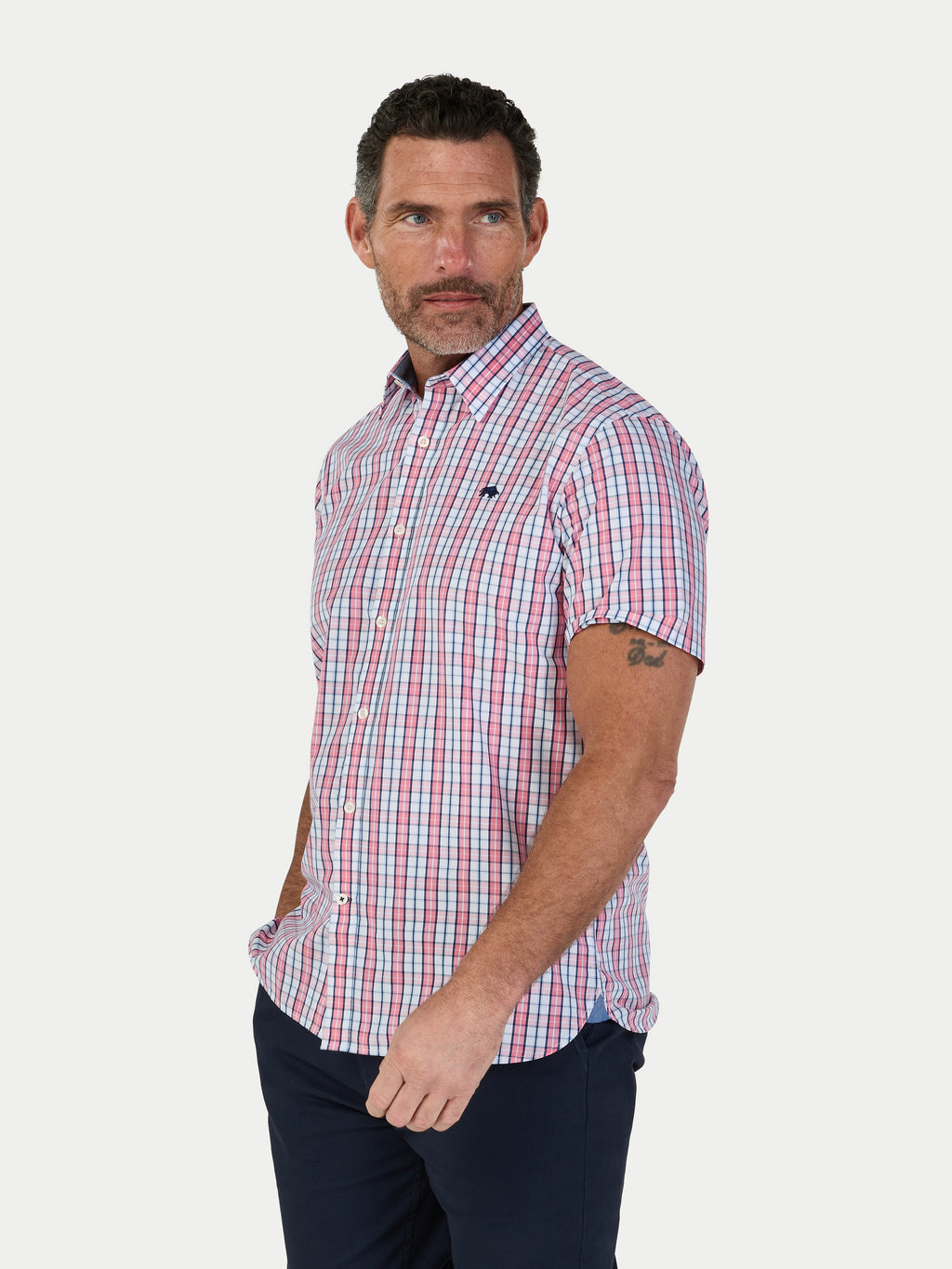 Man wearing Raging Bull Large Check Cotton Poplin Short Sleeve Shirt in Pink, available in sizes S-6XL.