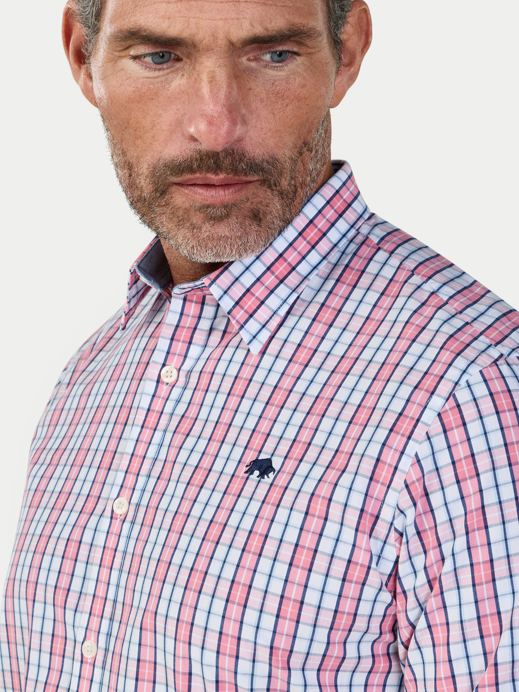 Man wearing Raging Bull Large Check Cotton Poplin Short Sleeve Shirt in Pink, chest and collar detail, available in sizes S-6XL.