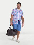 Man wearing Raging Bull Maldives Floral Linen Revere Short Sleeve Shirt in White and Classic Chino Short in Mid Blue, available in sizes S-6XL