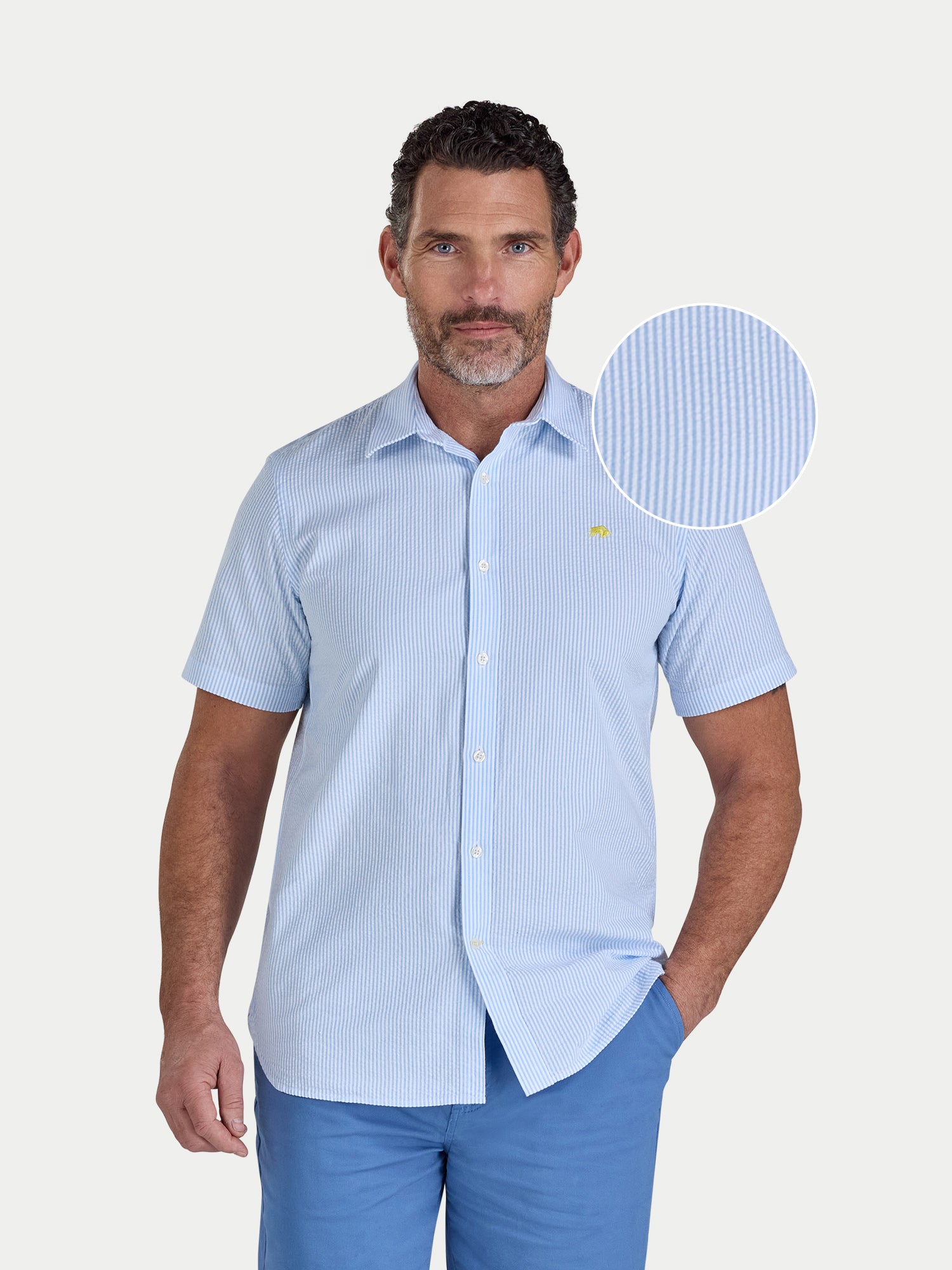 Man wearing Raging Bull Orleans Seersucker Stripe Short Sleeve Shirt in Sky Blue, available in sizes S-6XL, front detail. 