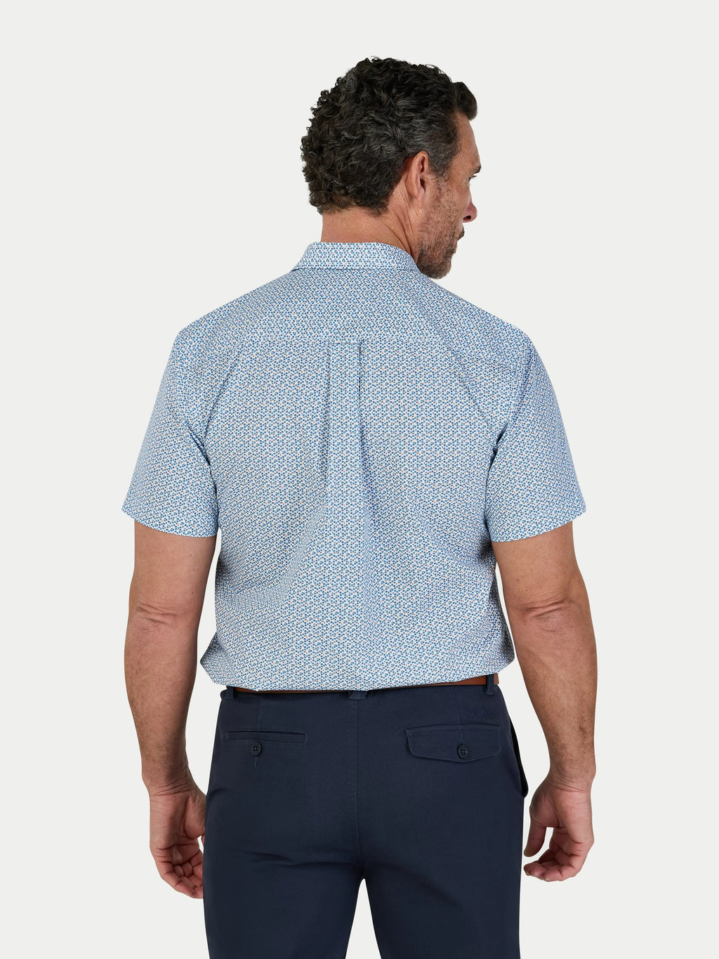 Man wearing Raging Bull Pentagon Pattern Cotton Poplin Short Sleeve Shirt in White, back detail, available in sizes S-6XL.