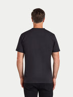 Man wearing a black t-shirt on a white background
