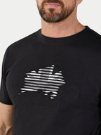 Man wearing a black t-shirt with a white graphic design on a plain background