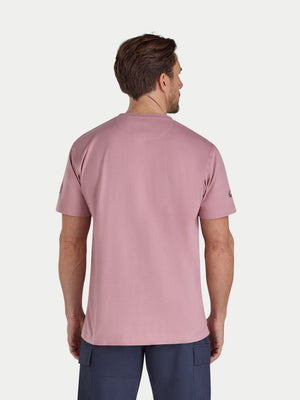 Man wearing a pink t-shirt on a white background