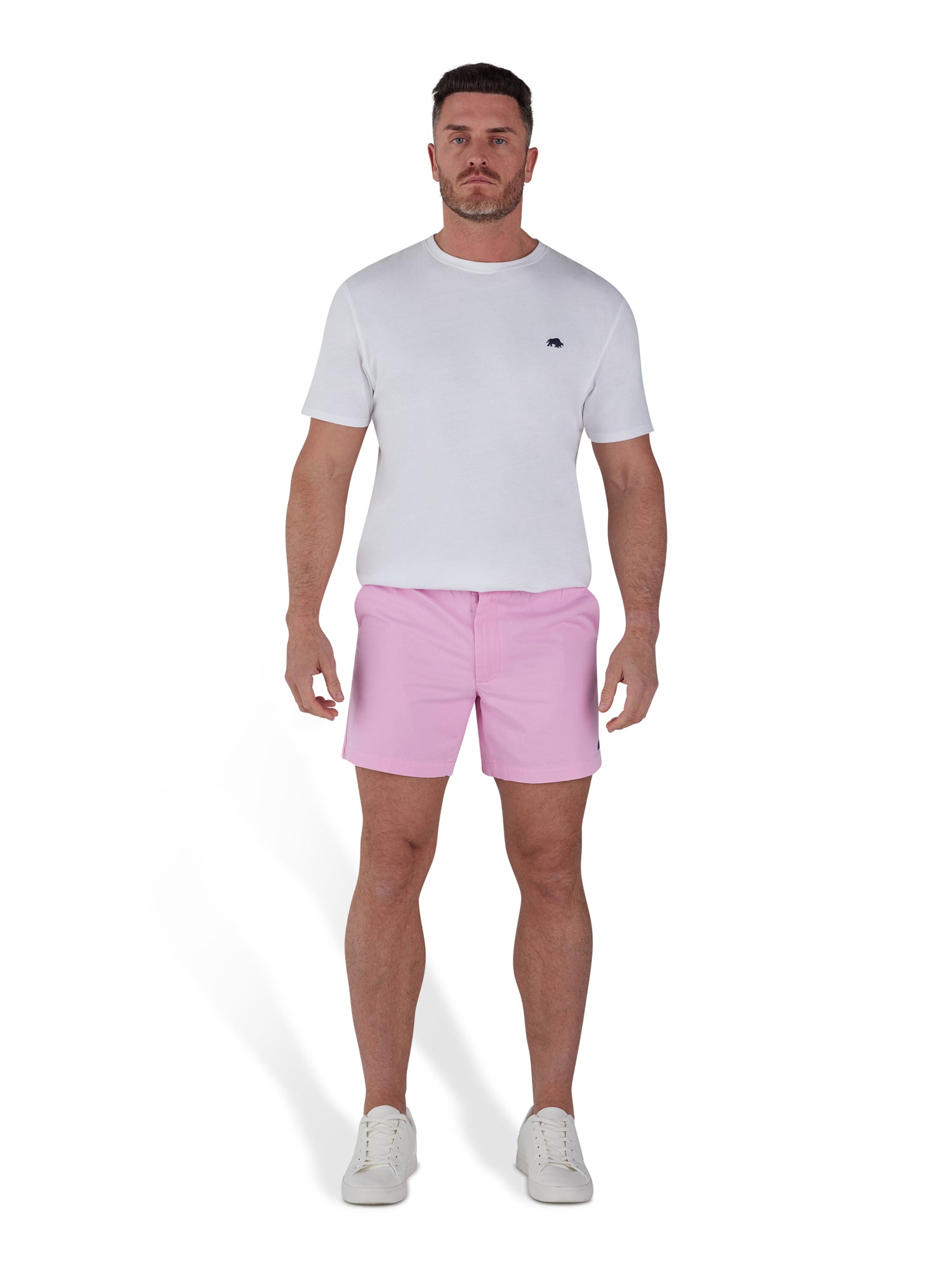 Man wearing pink shorts and white organic t-shirt.