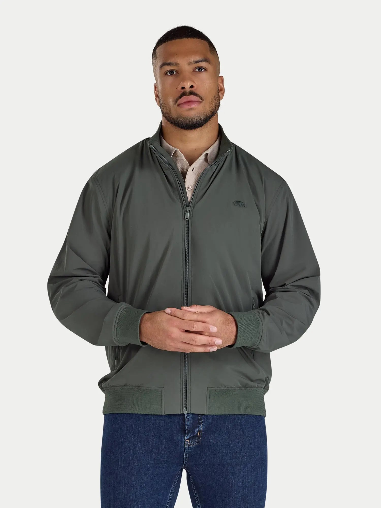 Man wearing a green jacket on a white background