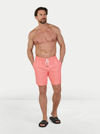 Man wearing Raging Bull Swim Shorts - Coral.