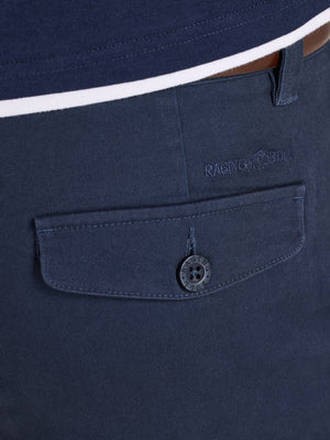 Navy blue shirt with a buttoned pocket and brand logo on a white background