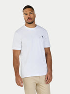 Man wearing Raging Bull Tapered Chino trousers in Tan and Classic Organic t-shirt in white, front. 