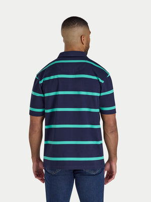 Man wearing a navy and teal striped polo shirt on a white background