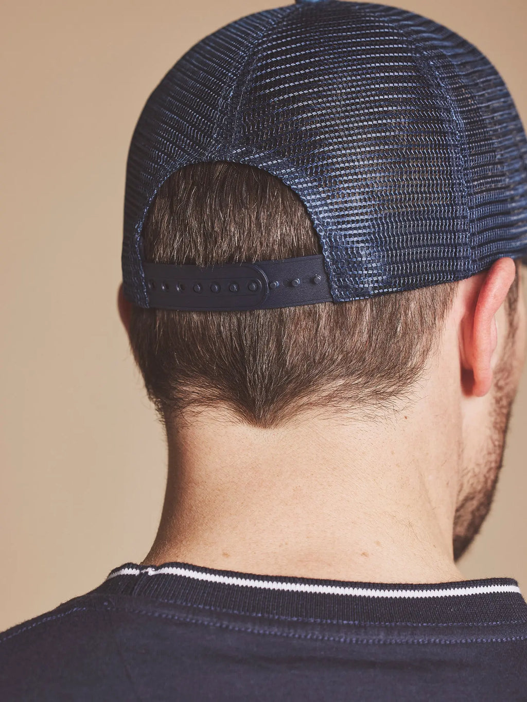 Man wearing a Raging Bull Tri Colour mesh back cap in Mid Blue, back. 