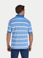 Man wearing a blue and white striped polo shirt on a light gray background