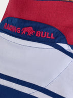 Close-up of a red, white, and blue fabric with 'Raging Bull' branding.