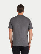 Man wearing a gray t-shirt on a white background
