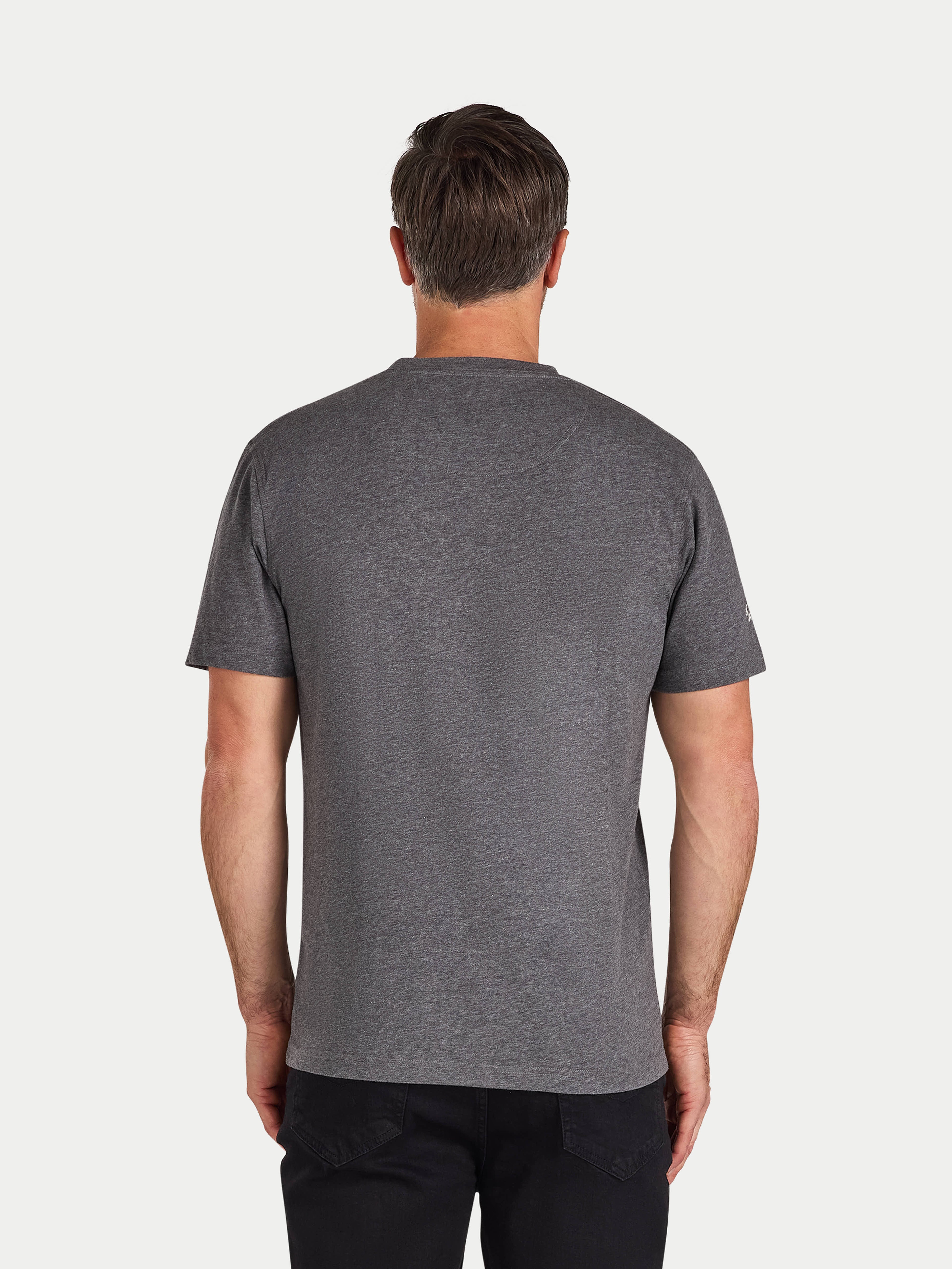 Man wearing a gray t-shirt on a white background